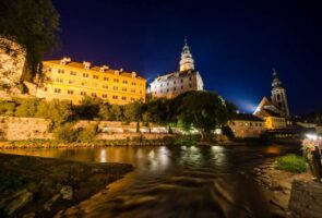 Český Krumlov castle at night with Vltava river
